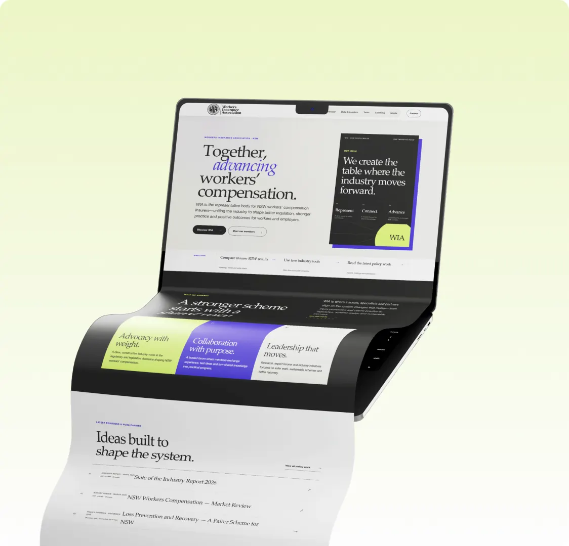 A folding laptop showing the Workers Insurance Association home page on the upper screen and the publications list running down the lower one.