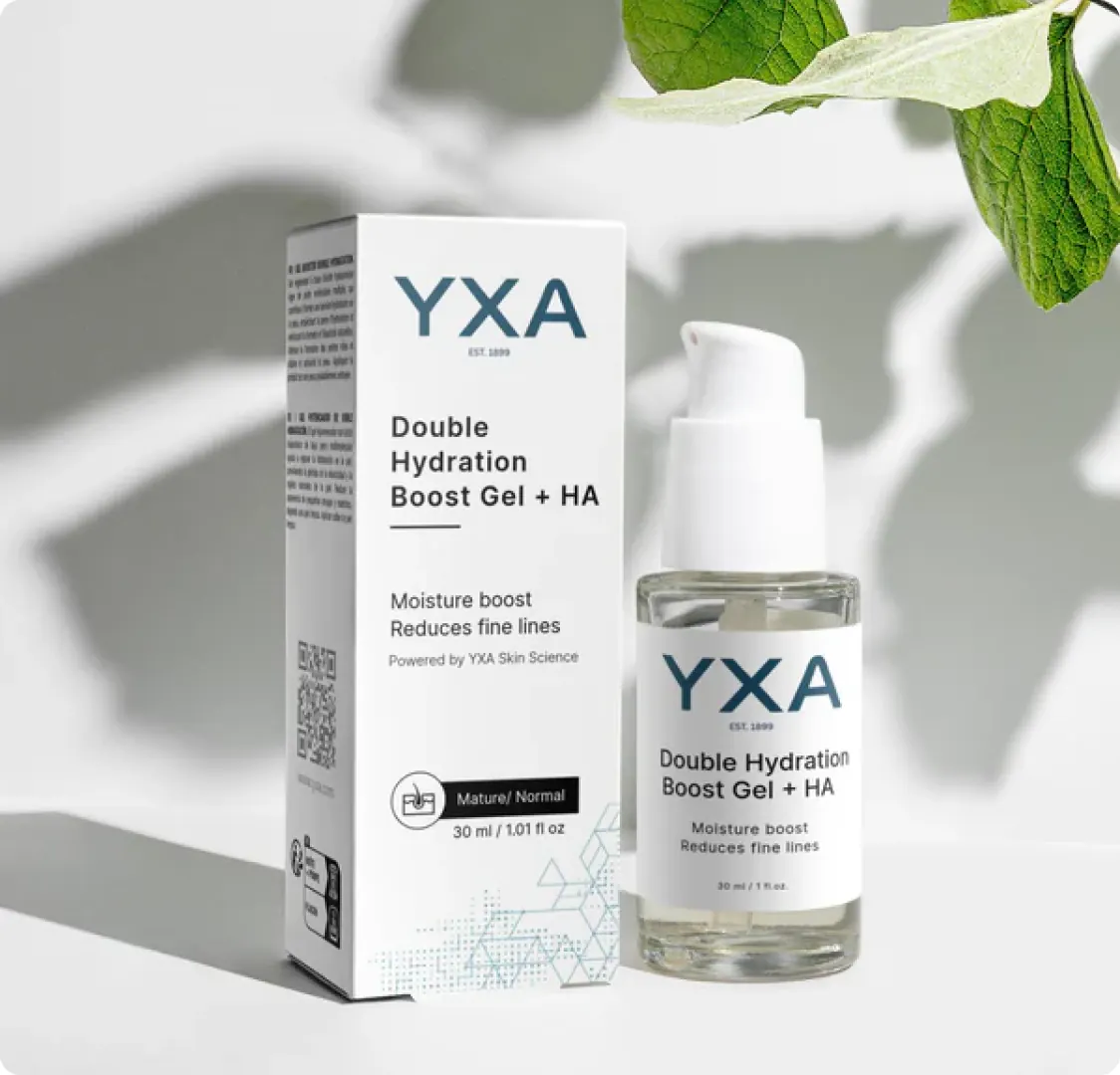 The Double Hydration Boost Gel bottle standing next to its box, with leaf shadows on the wall behind.